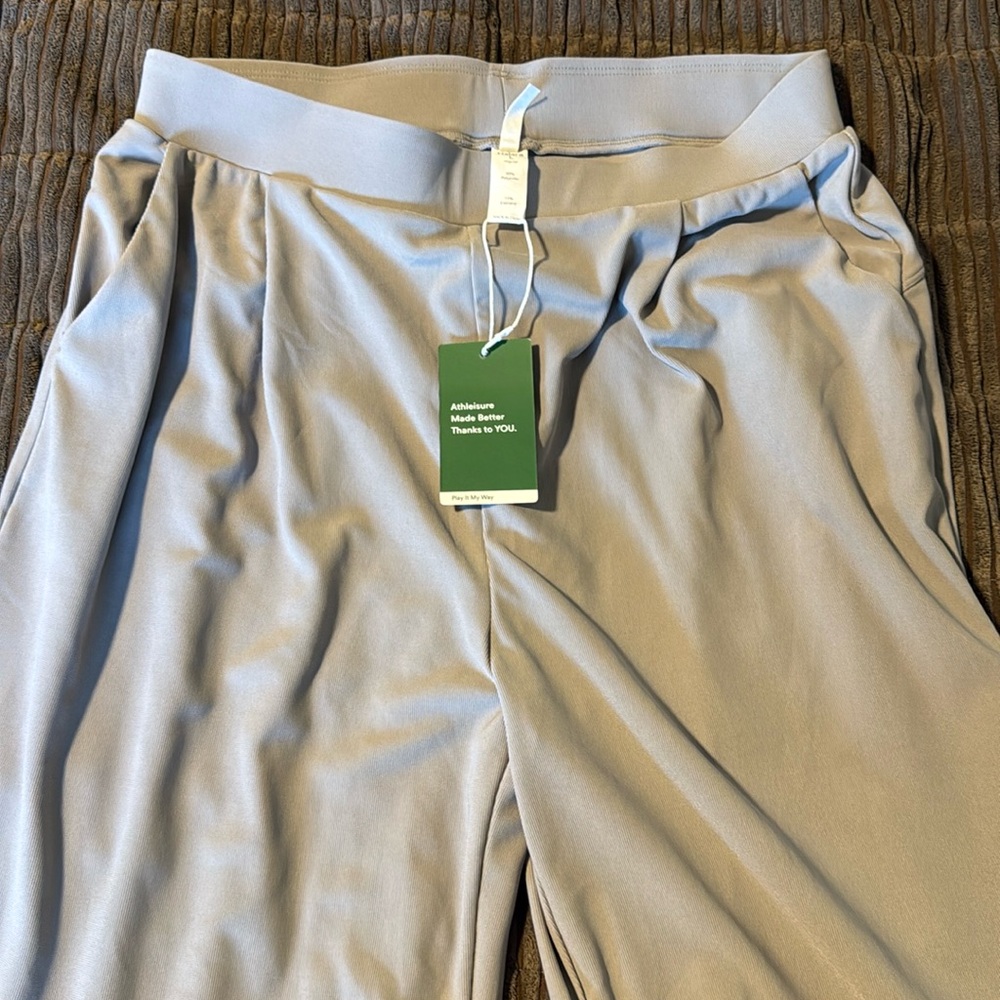 Halara flex high waisted body sculpt waist slimming side pocket wide leg